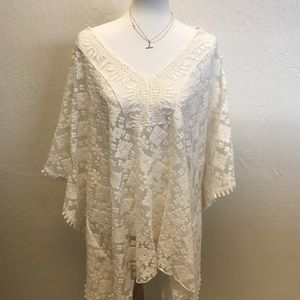 A white cover-up/kimono